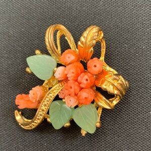 Elegant Gold and Coral Floral Brooch